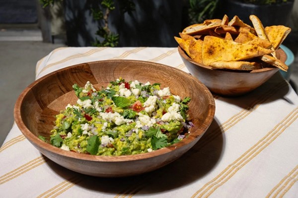 Cilantro-mint chutney guacamole with baked naan crisps