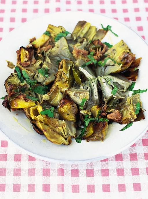 Cinder-baked artichokes with lemon, bay and prosciutto