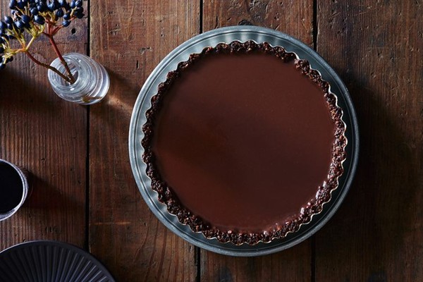 Cinnamon chocolate tart with a pecan crust