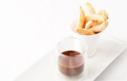 Cinnamon doughnuts and chocolate sauce