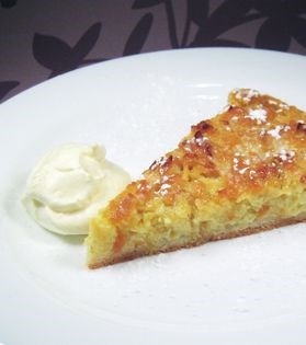 Citrus apple tart with lemon syllabub sauce