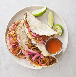 Citrus-braised pork tacos