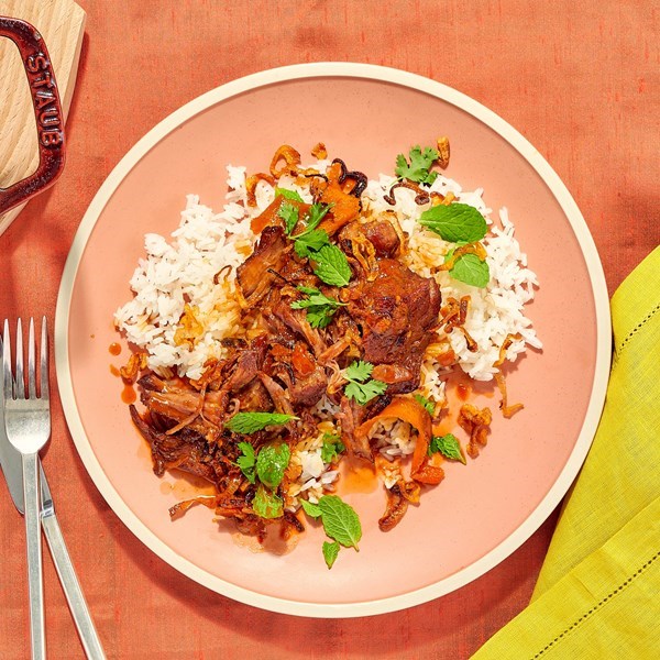 Citrus-braised pork with crispy shallots 