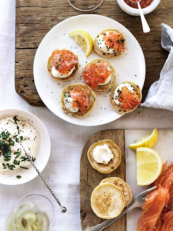 Citrus cured salmon on chive and buttermilk blini