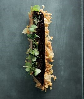 Citrus-glazed mackerel with tartine of almond and parmesan and soft herb salad