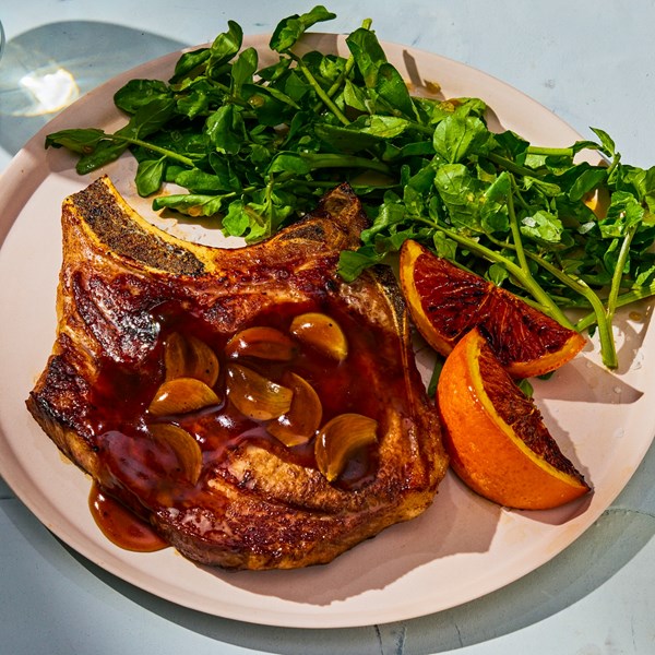 Citrus-glazed pork chops with watercress 
