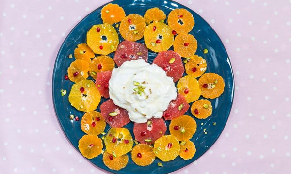 Citrus salad with honey cardamom syrup and yoghurt
