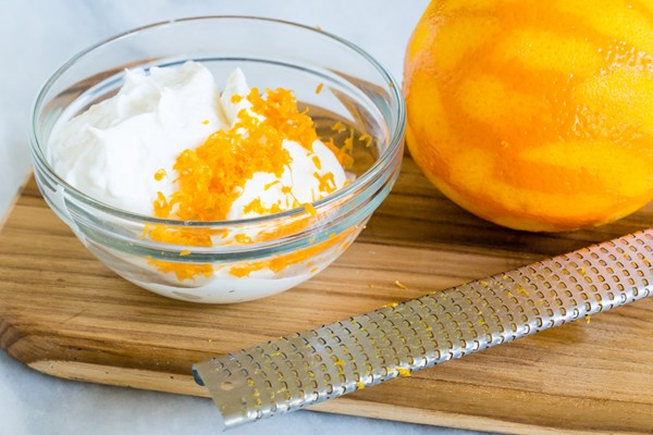 Citrus yogurt + orange zest + orange juice + granola + raspberries