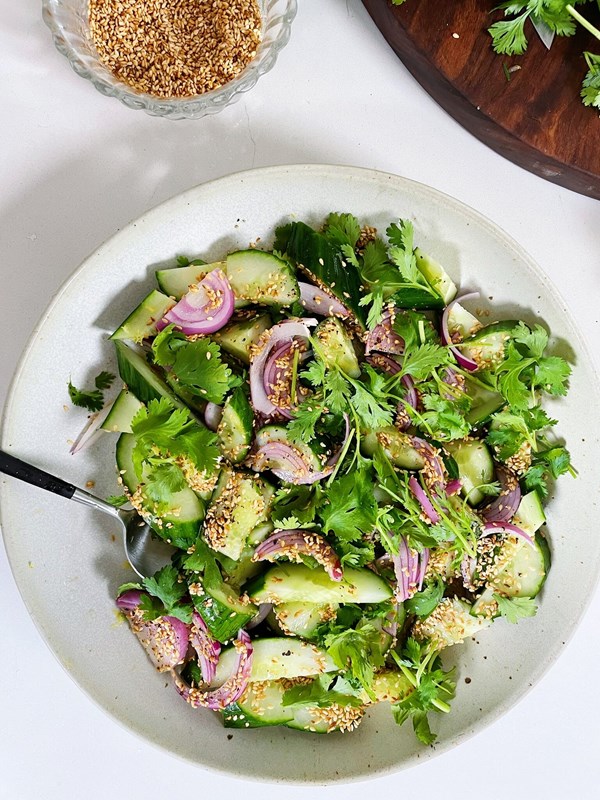 Citrusy cucumbers with red onion and toasted sesame
