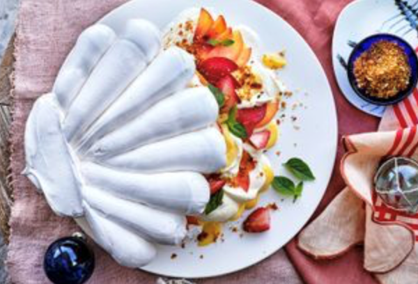Clam shell Pavlova with lemon curd and macadamia crunch