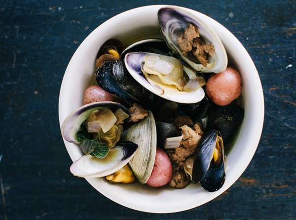 Clams and mussels with spicy pork sausage broth