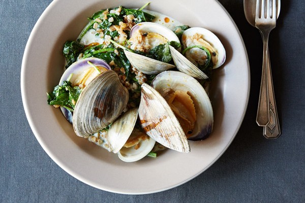 Clams with cream, farro, and baby kale