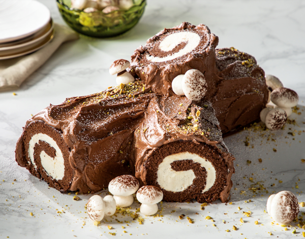Classic bûche de Noël [cold brew simple syrup, vanilla bean buttercream, chocolate buttercream, meringue mushrooms]