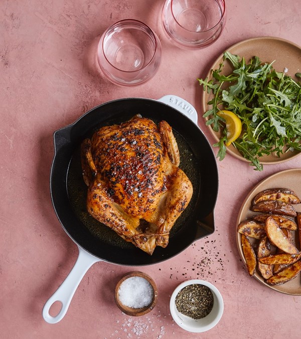 Classic roasted chicken and potatoes with fresh arugula salad