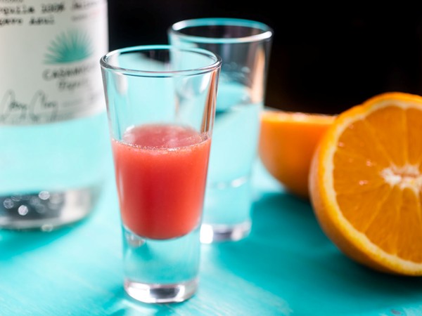 Classic sangrita with orange juice, pomegranate, and chili