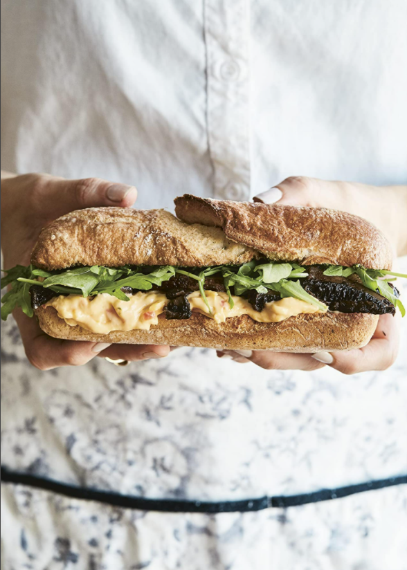 Claudia sandwich - balsamic mushrooms with Calabrian chile-feta spread, basil pesto, and arugula