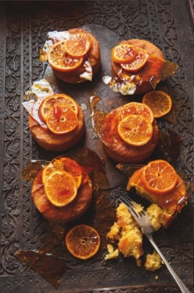 Clementine and almond cakes with poached fruits and caramel