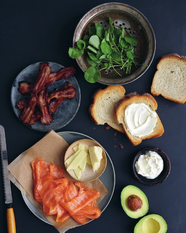Club sandwich with gravlax, avocado, bacon, and Beaufort