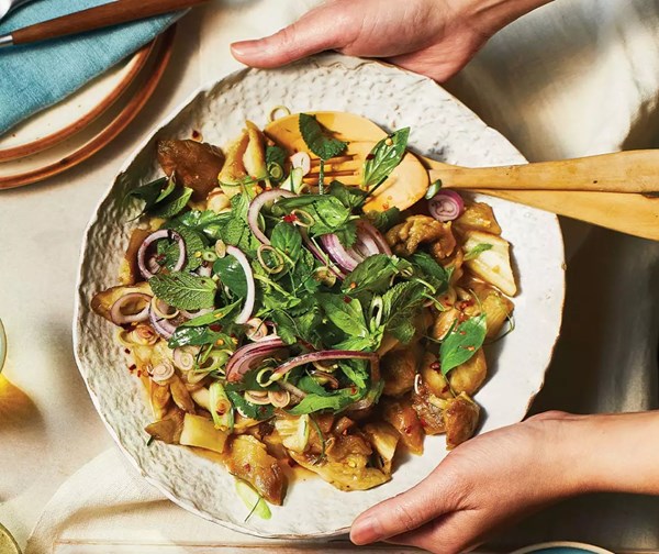 Coal-roasted aubergine with 'waterfall' herb salad