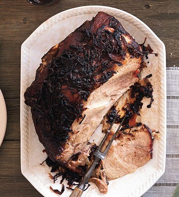 Cocoa and spice slow-roasted pork with onions