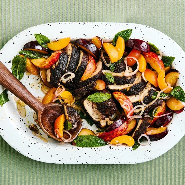 Cocoa-blackened chicken thighs with stone fruit