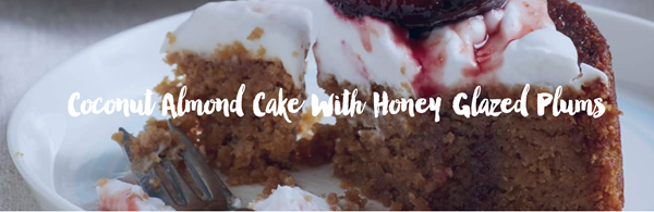 Coconut almond cake with honey-glazed plums