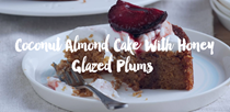 Coconut almond cake with honey-glazed plums