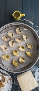 Coconut and kaffir lime broth with sweet potato wontons