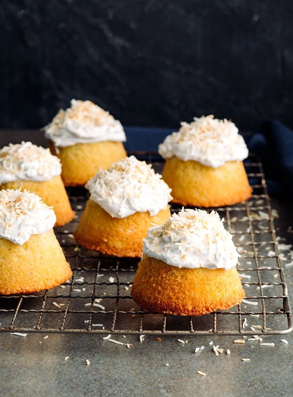 Coconut and lime curd cakes with whipped cream coconut frosting