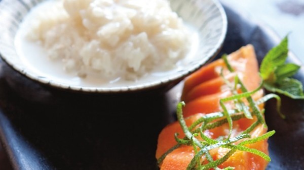 Coconut and sticky rice pudding with lime and papaya salad