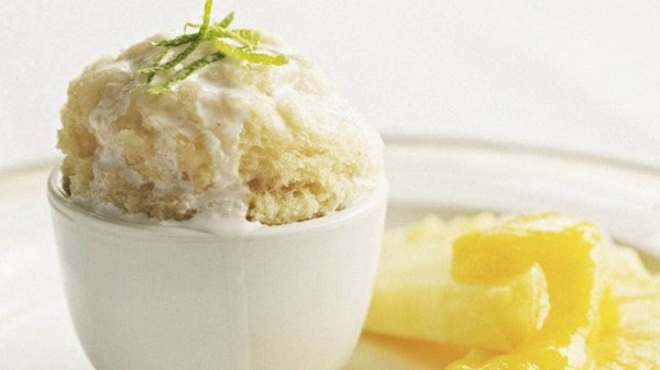 Coconut bread pudding with fresh pineapple and mango purée