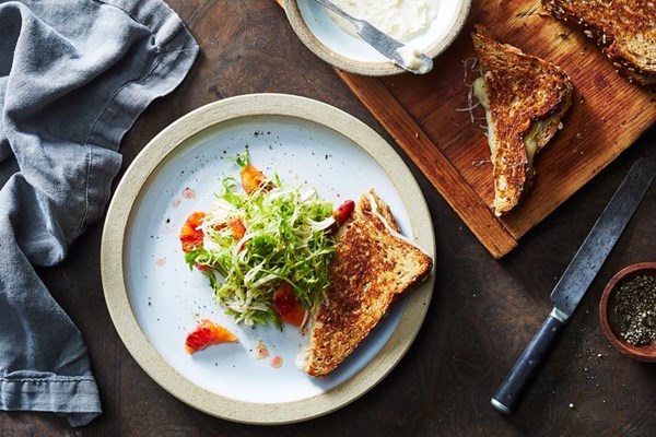 Coconut butter grilled cheese with frisée and blood orange