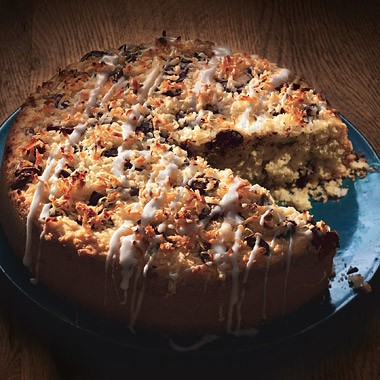 Coconut cake with chocolate chunks and coconut drizzle