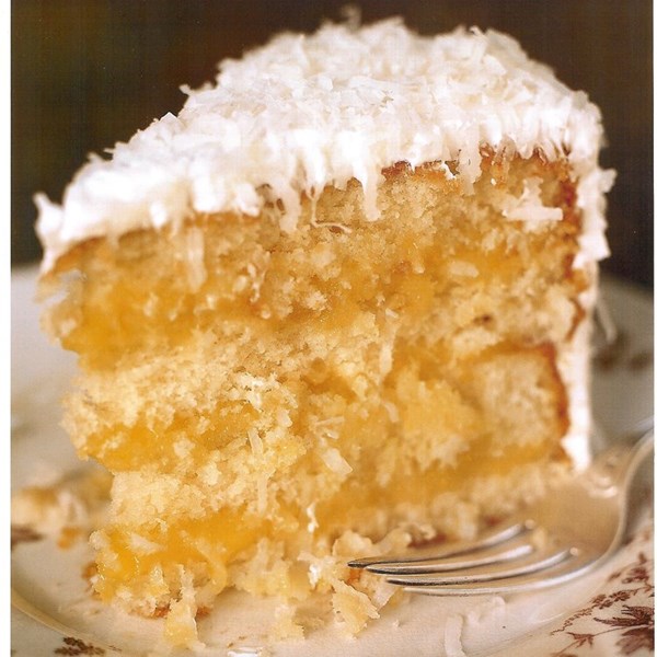Coconut cake with lemon curd filling and seven-minute frosting