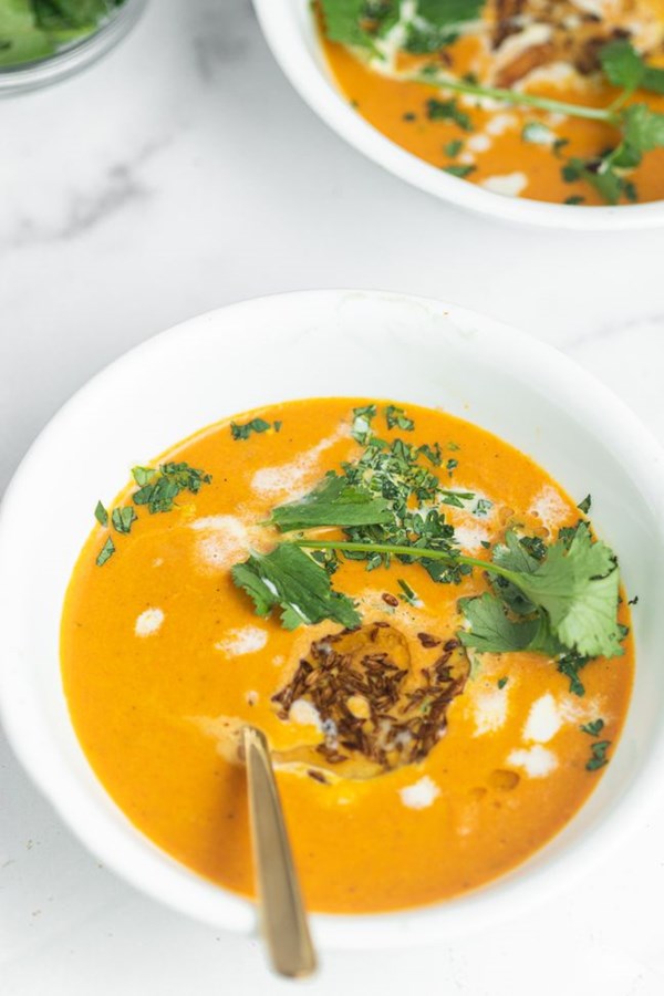Coconut carrot soup with cumin oil