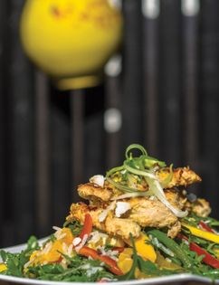 Coconut chicken, mango and passion fruit salad