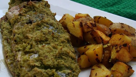 Coconut coriander stuffed sea bass with spiced potatoes