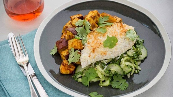 Coconut-crusted chicken with red curry kumara