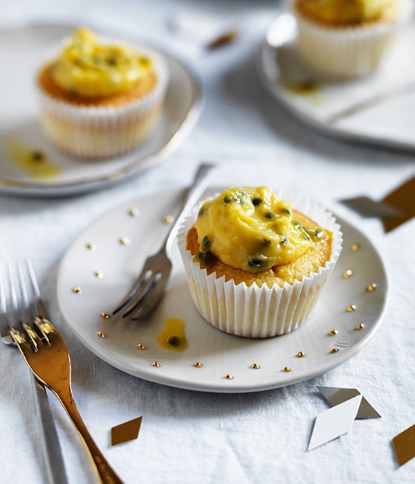Coconut cupcakes with passionfruit curd