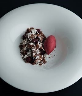 Coconut mousse with cherry sorbet and chocolate crumbs