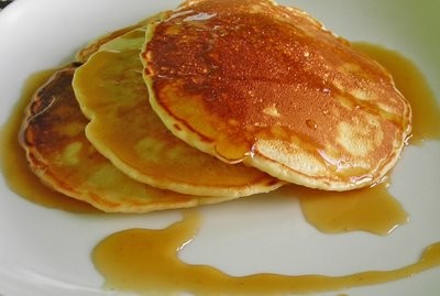 Coconut pancakes with cardamom syrup