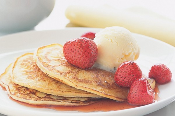 Coconut pancakes with Malibu-roasted strawberries