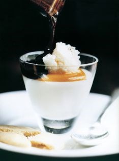 Coconut pannacotta with white chocolate granita and black olive caramel
