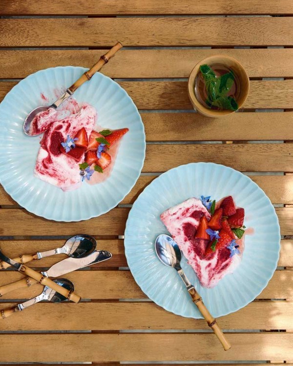 Coconut raspberry ripple parfait with macerated strawberries