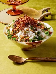 Coconut rice with pea shoots and citrusy cashews