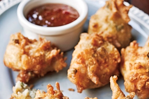 Coconut shrimp beignets with pepper jelly sauce