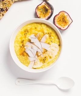 Coconut, turmeric + ginger porridge w passionfruit + banana [breakfast bowl]