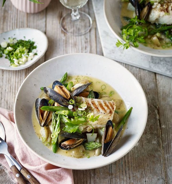 Cod with a spring broth of asparagus, Jersey Royals and mussels