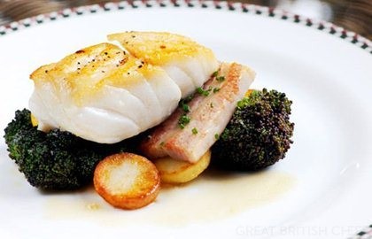 Cod with pork belly, purple sprouting broccoli and lemon butter sauce
