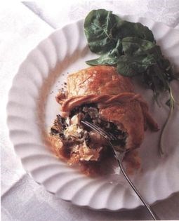 Cod with sorrel and spinach purée in puff pastry packets